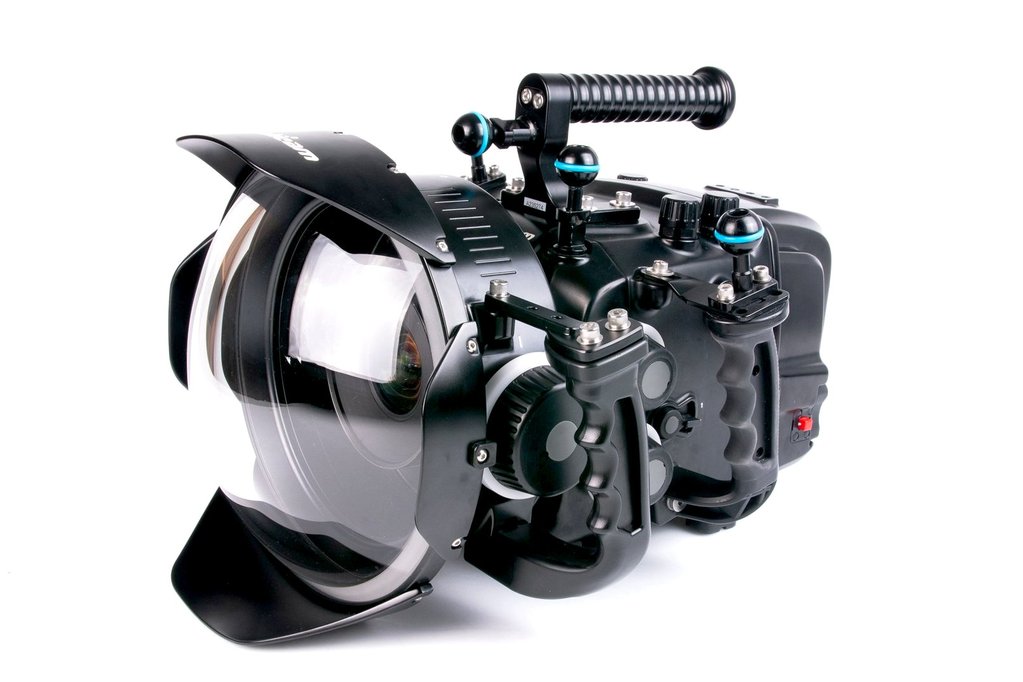 Large Nauticam Fisheye MIL Port attatched to a mirrorless camera housing along with dual grip handles, for high-end underwater photography work.